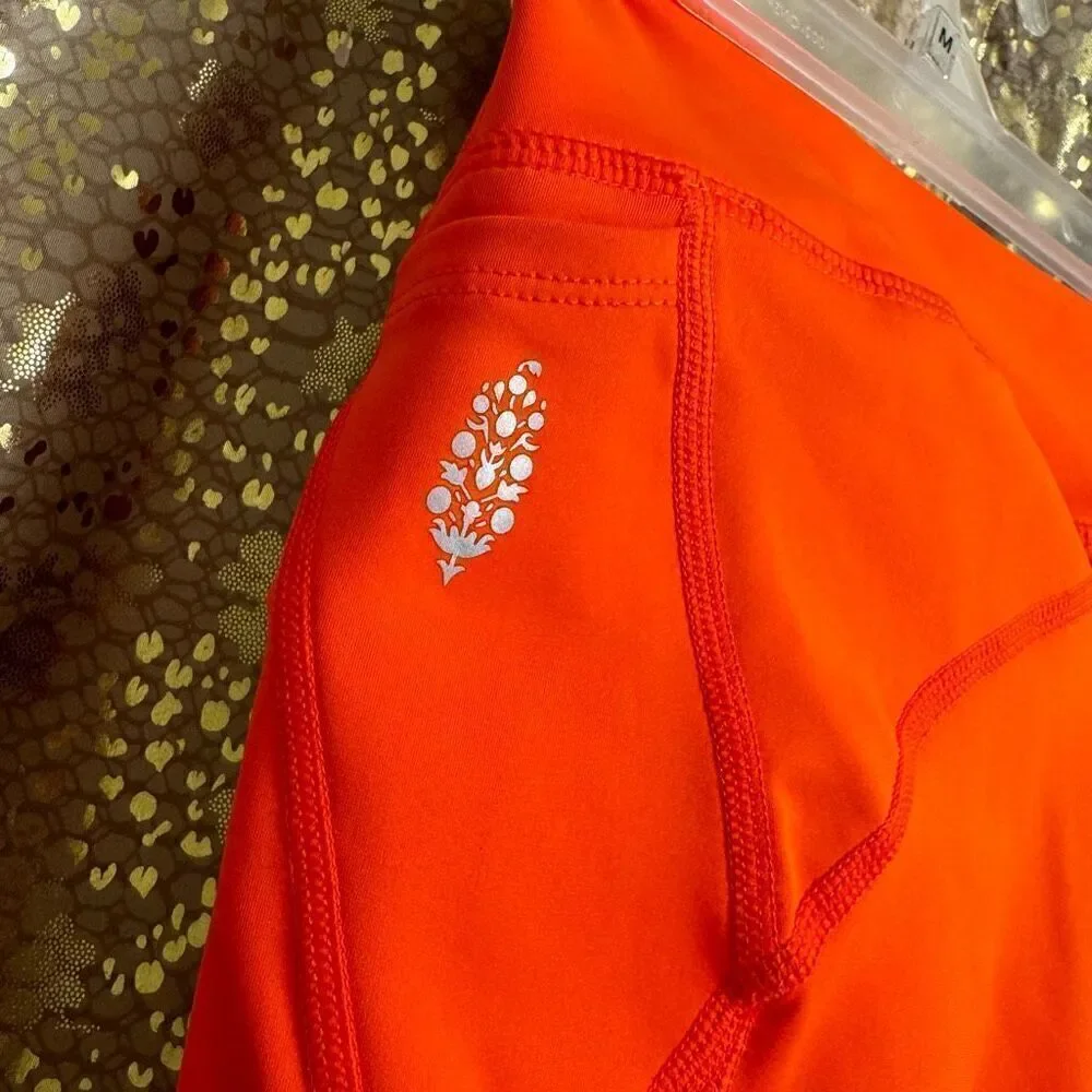 Free People Movement Space Race Orange Bike Shorts Medium NWOT